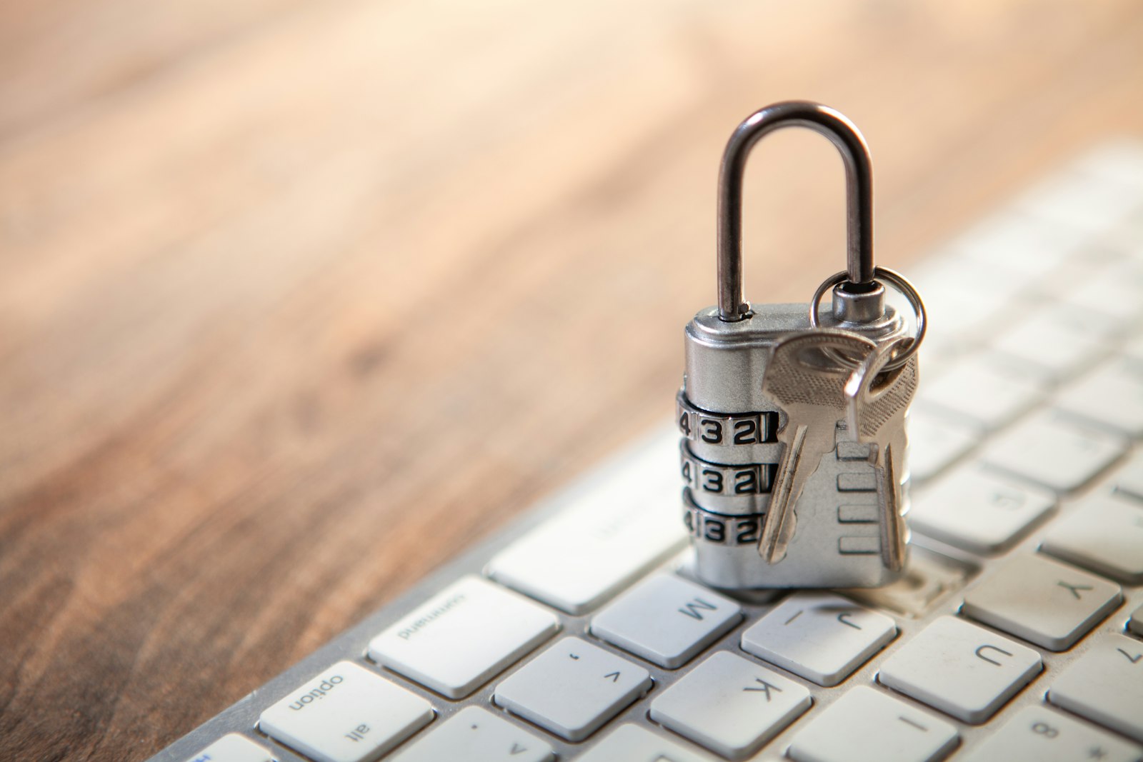 Padlock and keys on a keyboard, symbolizing how a VPN encrypts and secures your internet connection