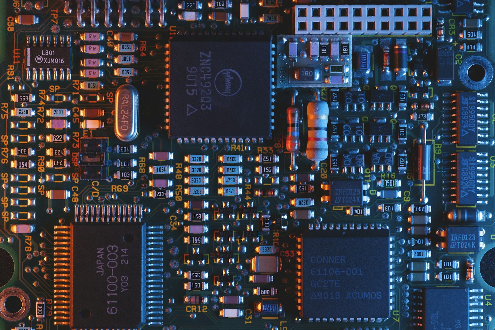 Close-up of a blue circuit board representing AI chips explained