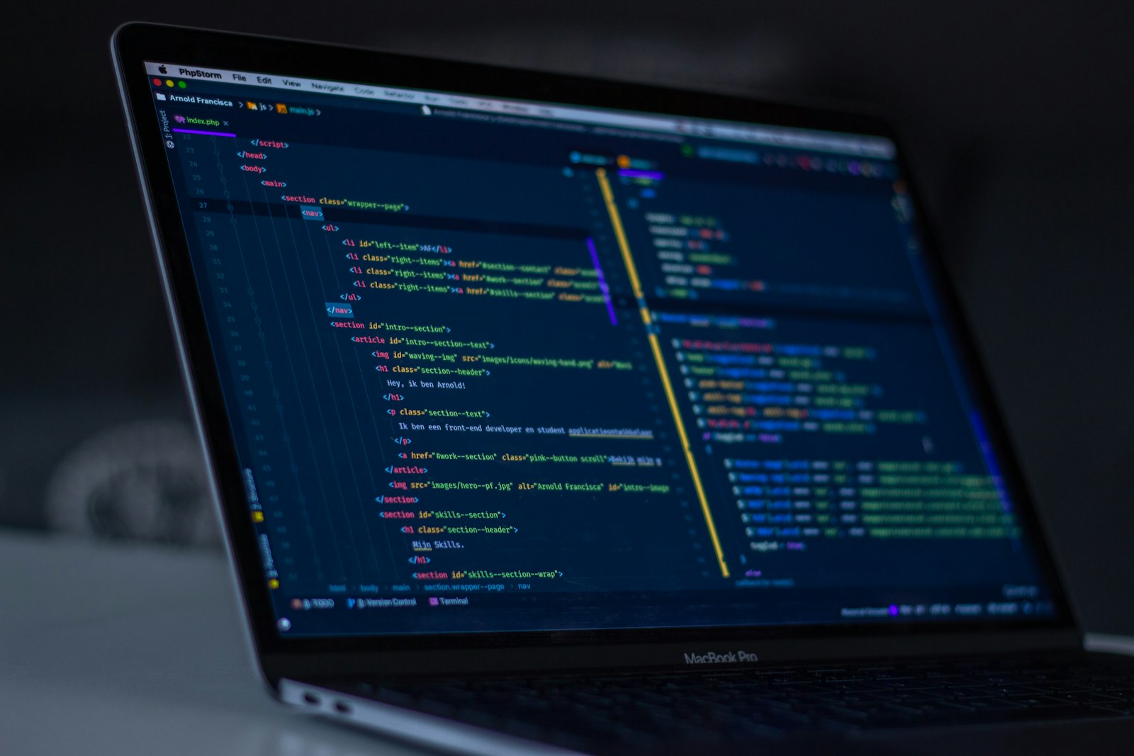 Code on a laptop screen representing open-weight AI models