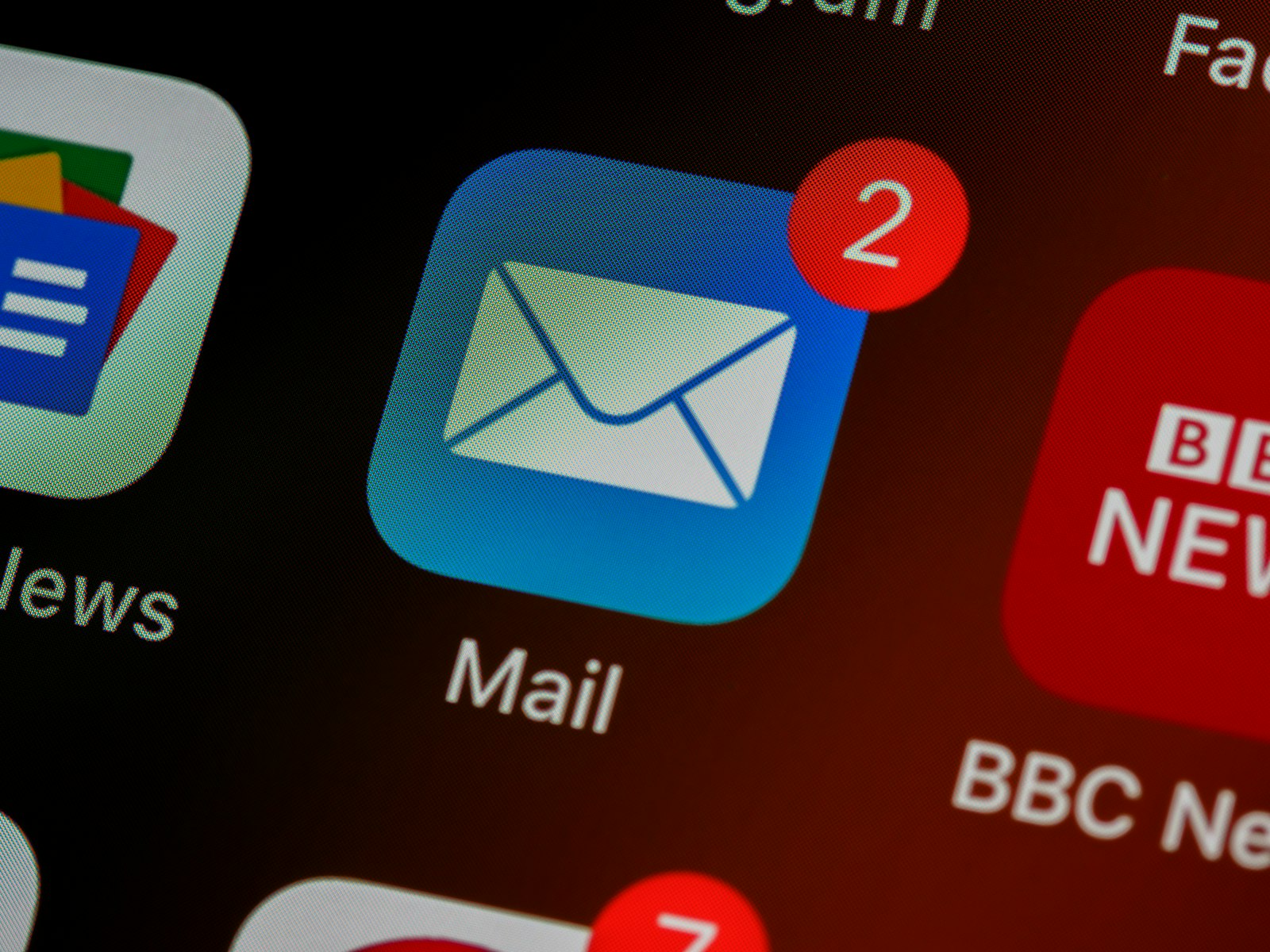 Mail app icon on a phone screen representing SPF, DKIM, and DMARC email authentication