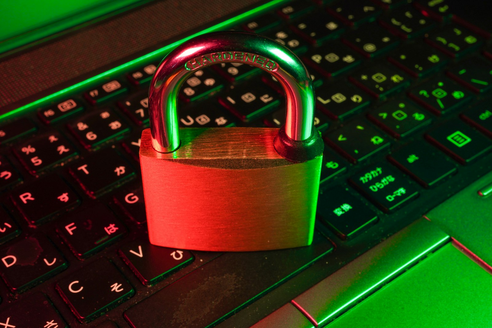 Red padlock on a black computer keyboard representing what HTTPS secures